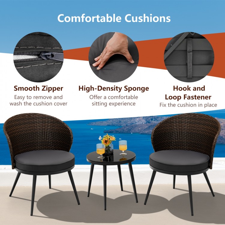 Two comfortable chairs with soft cushions and a tempered glass tabletop in a brown rattan bistro set for outdoor.
