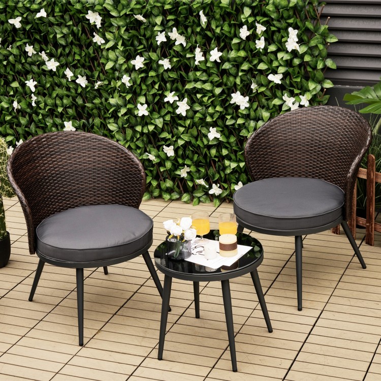 Curved backrest patio bistro set with soft cushions and tempered glass tabletop, perfect for outdoor relaxation.