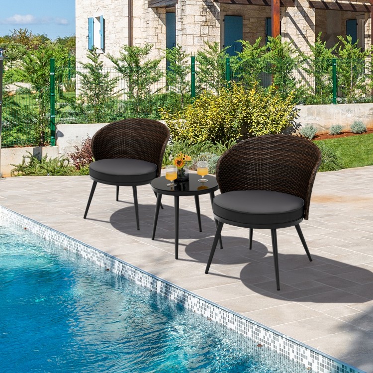 Curved backrest patio bistro set with soft cushions and tempered glass tabletop, perfect for outdoor relaxation by the.