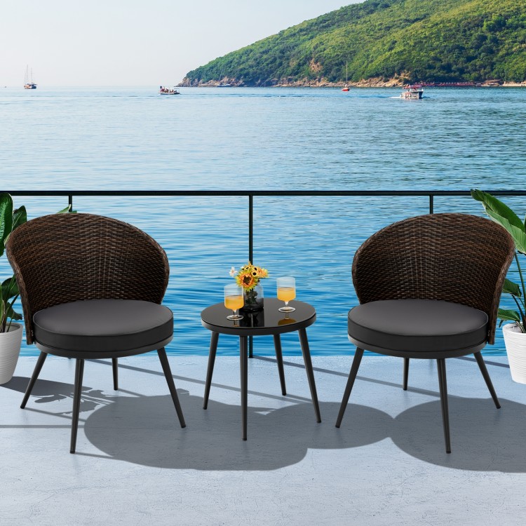 Close-up of a soft cushion on a curved backrest chair from the 3-piece patio rattan bistro set, designed for comfort.
