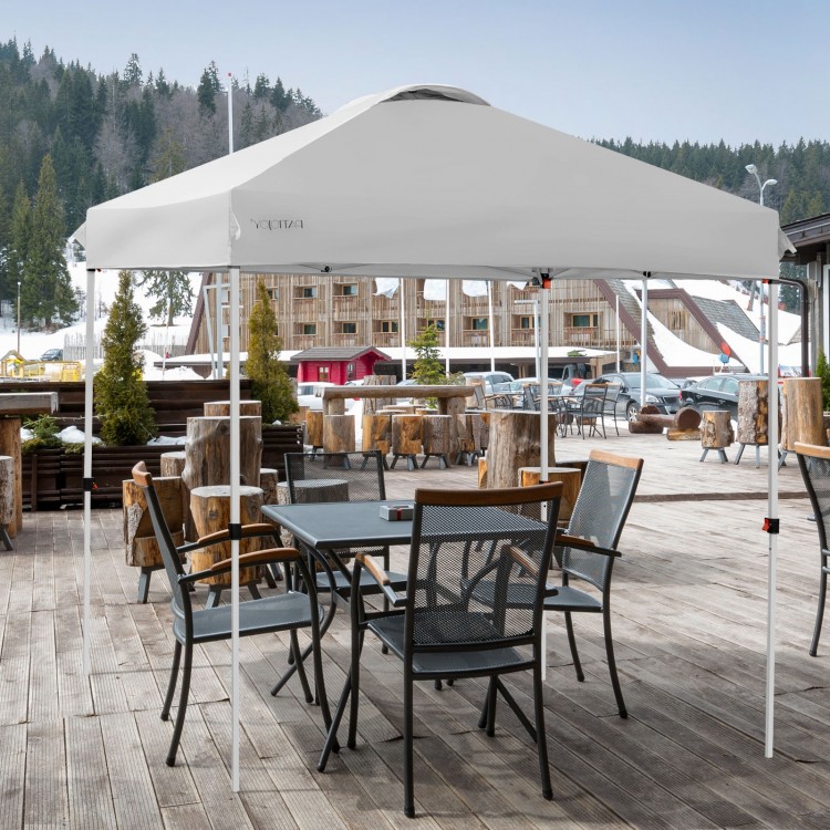 Gray 6.6 x 6.6 feet outdoor pop-up canopy tent with heavy-duty steel frame, set up for shade over a table and chairs.