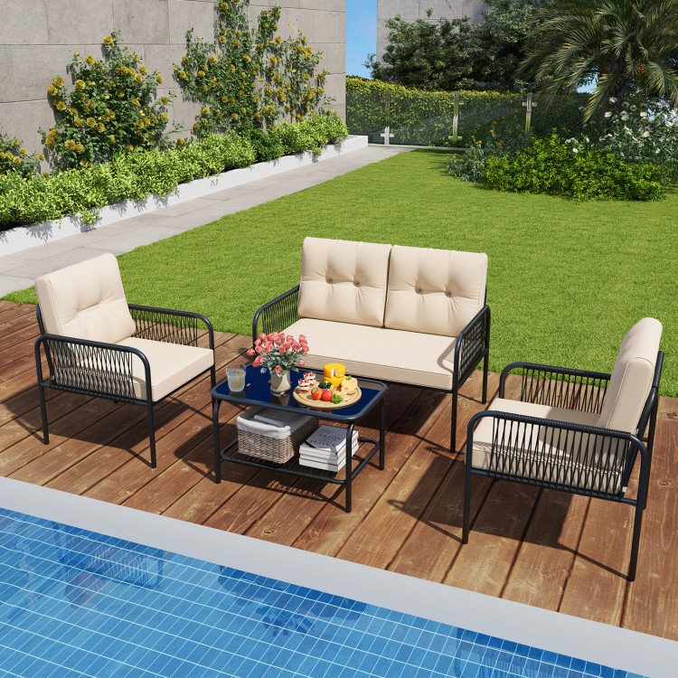 4-piece patio furniture set featuring a beige PE rattan loveseat and chairs, perfect for outdoor relaxation by the.