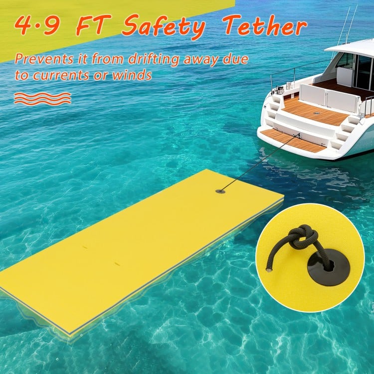 Yellow 3-layer tear-resistant foam floating pad with 5' safety tether, ideal for lakes and pools, prevents drifting.