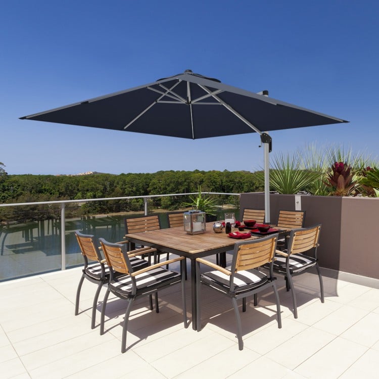 10 ft navy offset patio umbrella with aluminum pole, 360° tilt, and sturdy steel ribs for large dining sets.