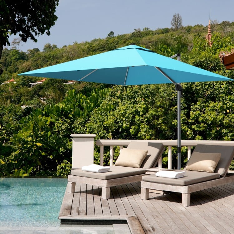 10 ft blue offset cantilever umbrella with aluminum pole and 360-degree tilt, perfect for patio shade and stability.