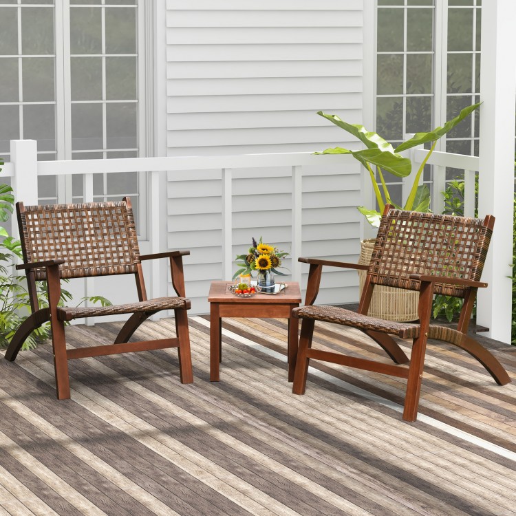 Two armchairs and a wooden table from the 3 Pieces Outdoor Wooden Patio Rattan Furniture Set, ideal for patio.