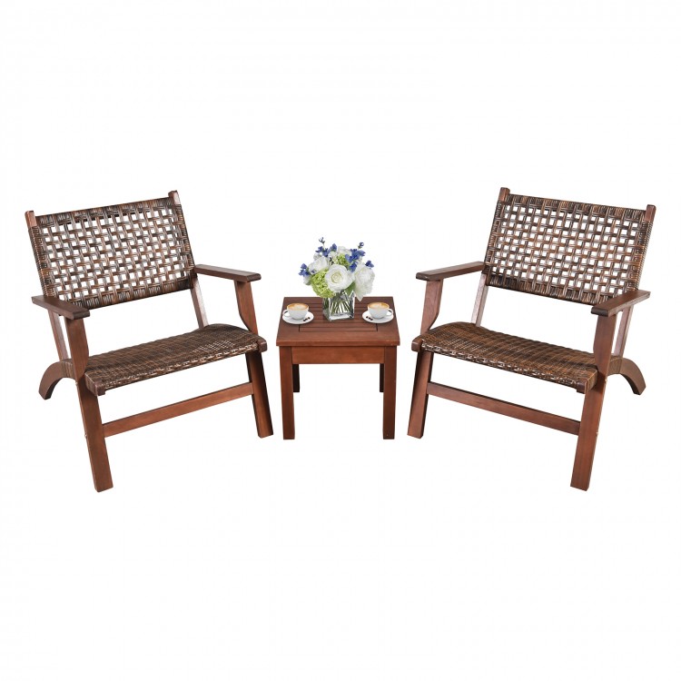 Two wooden armchairs with hand-woven rattan and a solid wood table, perfect for outdoor patio or garden use.