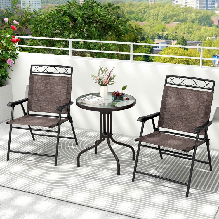 Close-up of the breathable fabric on a folding patio chair, designed for comfort and durability in outdoor settings.