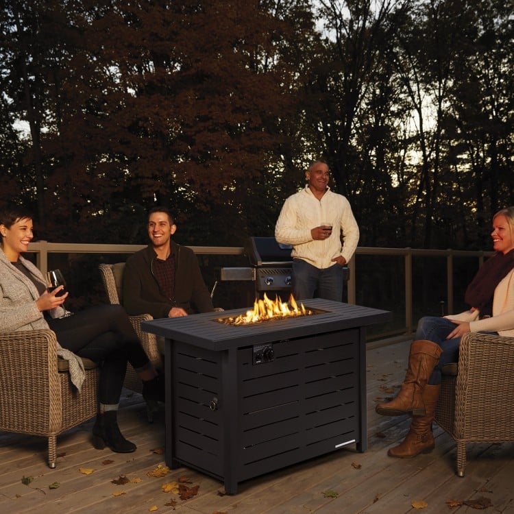 Rectangular propane fire pit table with lava rocks, 60,000 BTU, and waterproof cover, perfect for outdoor gatherings.