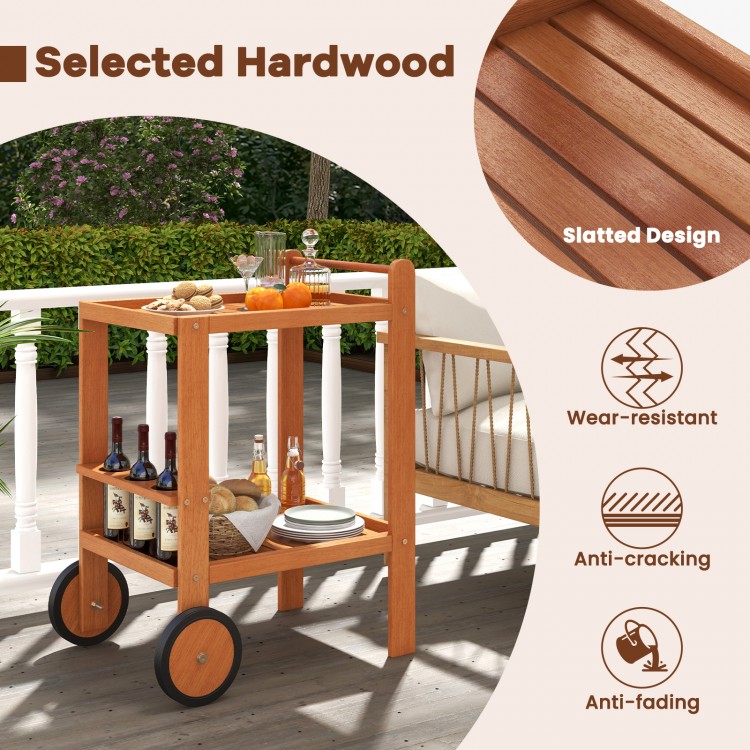 2 Tier rolling serving cart in selected hardwood with slatted design, featuring wine bottle holders and rubber wheels.