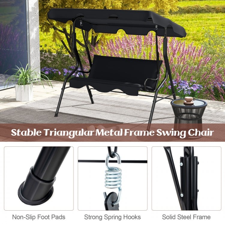 Three-seat black patio canopy swing chair with durable steel frame, perfect for outdoor relaxation in garden or yard.
