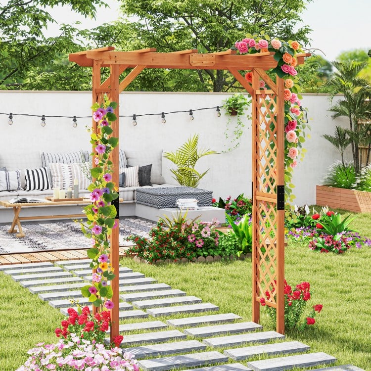 7 feet wooden garden arbor arch with lattice side panels, perfect for supporting climbing plants in outdoor settings.