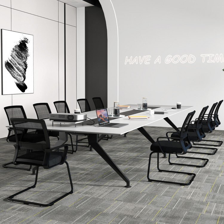 Side view of an office guest chair featuring breathable mesh back and armrests, designed for comfort in waiting areas.