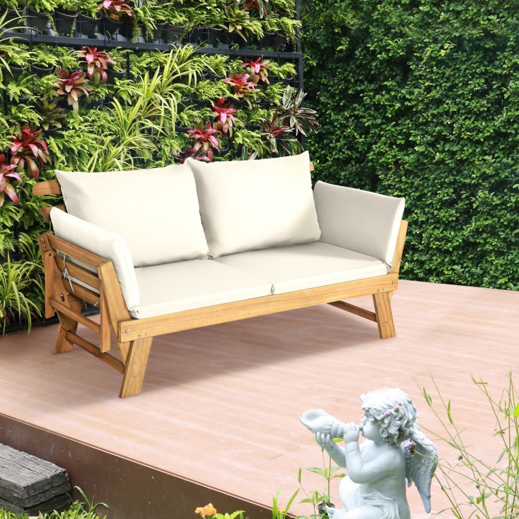 Adjustable patio convertible sofa in solid acacia wood with thick white cushions, perfect for outdoor relaxation.
