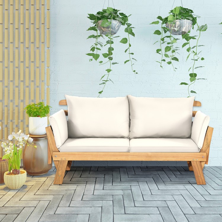 Side view of adjustable patio convertible sofa with thick white cushions, featuring a solid acacia wood frame, ideal.