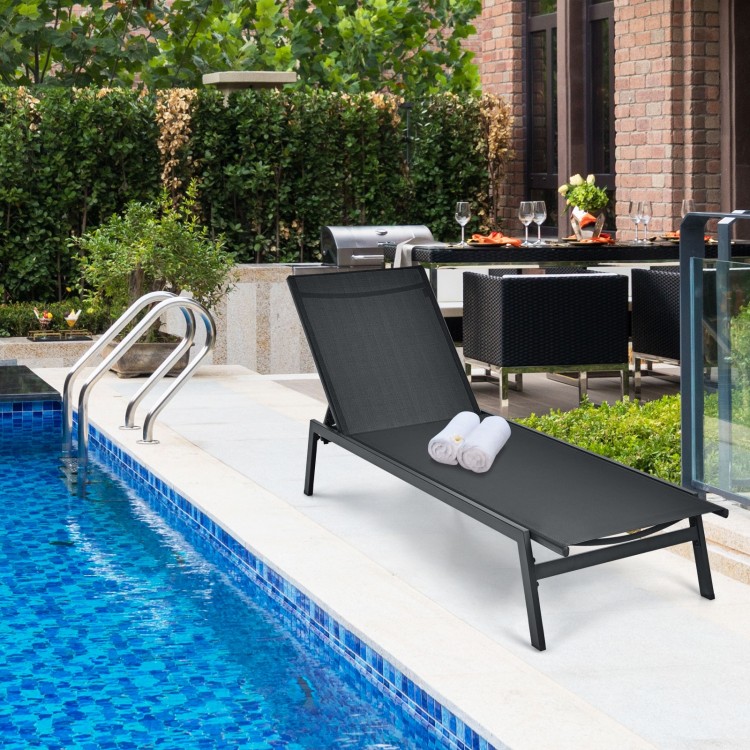 Outdoor reclining chaise lounge chair in black with 6-position adjustable backrest, perfect for poolside relaxation.