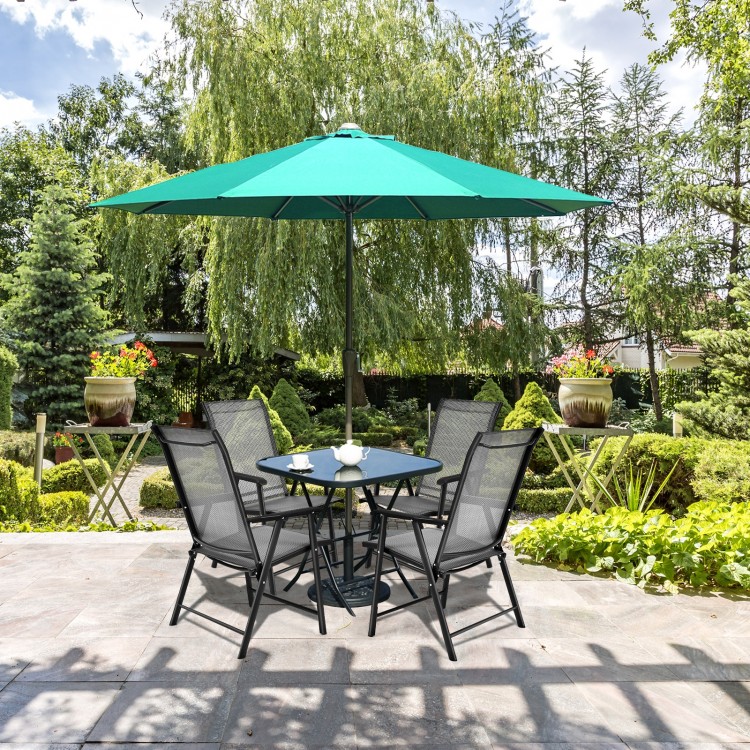Gray folding textilene chairs set with steel frames, perfect for outdoor camping and gatherings, shown in a garden.