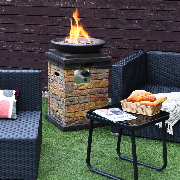 Brown outdoor propane burning fire bowl column with stacked stone look, providing 40,000 BTU heat for patio gatherings.