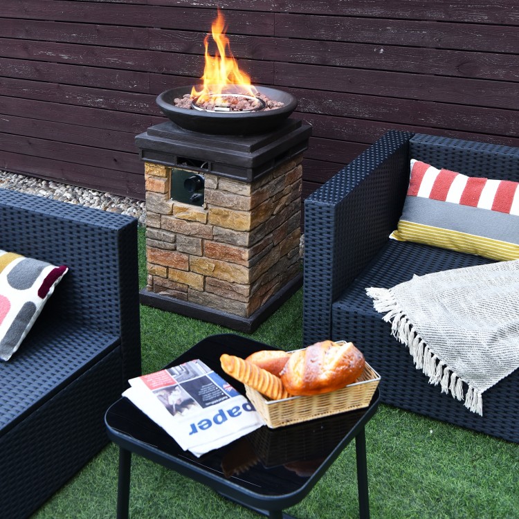 Brown outdoor propane burning fire bowl column with stacked stone look, providing 40,000 BTU heat for cozy gatherings.