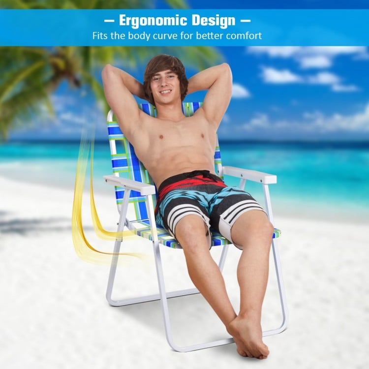 Folding beach chair in blue with ergonomic design, featuring a sturdy steel frame for comfort and portability.