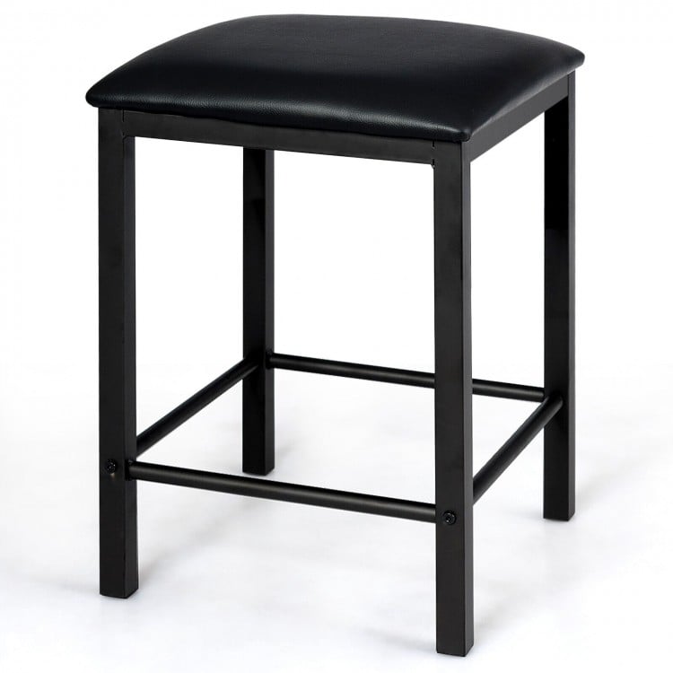 Black faux leather stool with durable iron legs, designed for space-saving in kitchens or dining rooms.
