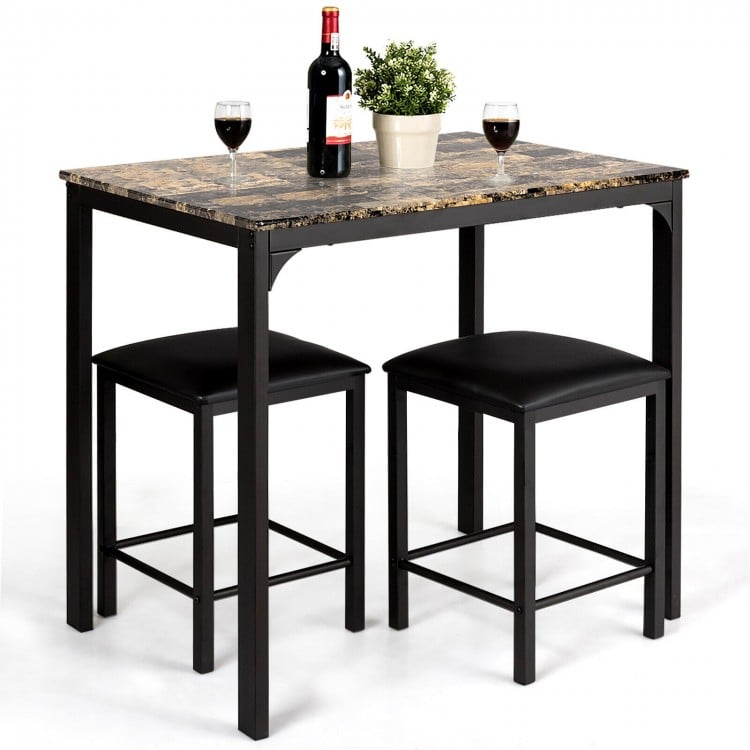 Stylish kitchen counter height table set with faux marble top and black legs, ideal for cozy dining in small spaces.