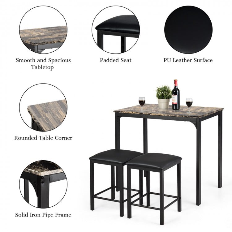 Counter height faux marble table with two black PU leather stools, perfect for small kitchens or dining areas.