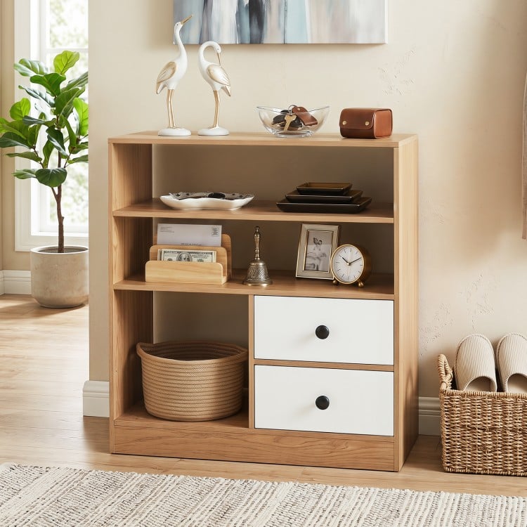 Open storage cabinet showcasing spacious countertop and large compartment, perfect for books and decor organization.