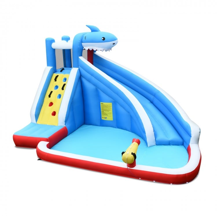 Inflatable Shark Bounce House featuring a water slide, climbing wall, and splash pool for backyard fun.
