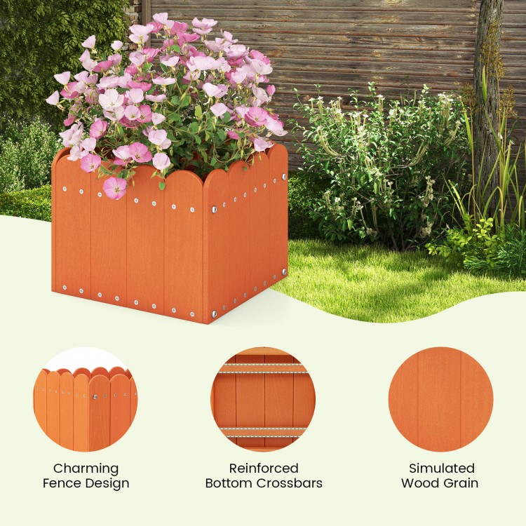 Square orange planter box with charming fence design and drainage gaps, perfect for flowers and vegetables in gardens.