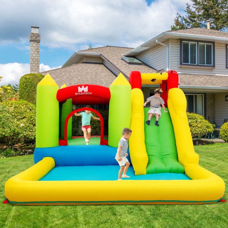 Brightly colored outdoor inflatable bounce house with slide, suitable for gardens and parks, made of durable Oxford.