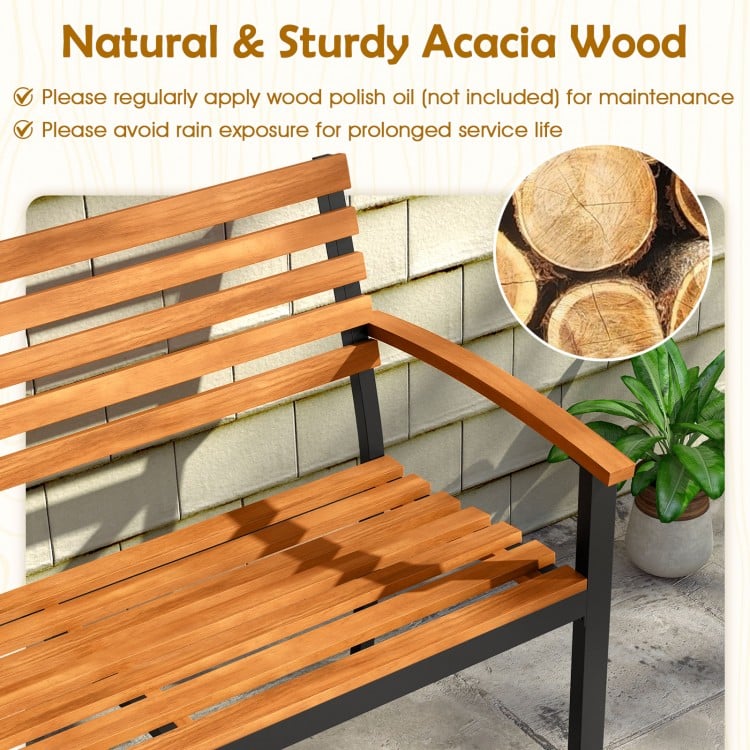 Acacia wood outdoor bench with backrest and armrests, ideal for patio seating and designed for stability and comfort.