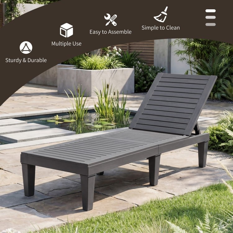 Grey outdoor chaise lounge chair with adjustable backrest, sturdy design, perfect for patio or poolside relaxation.