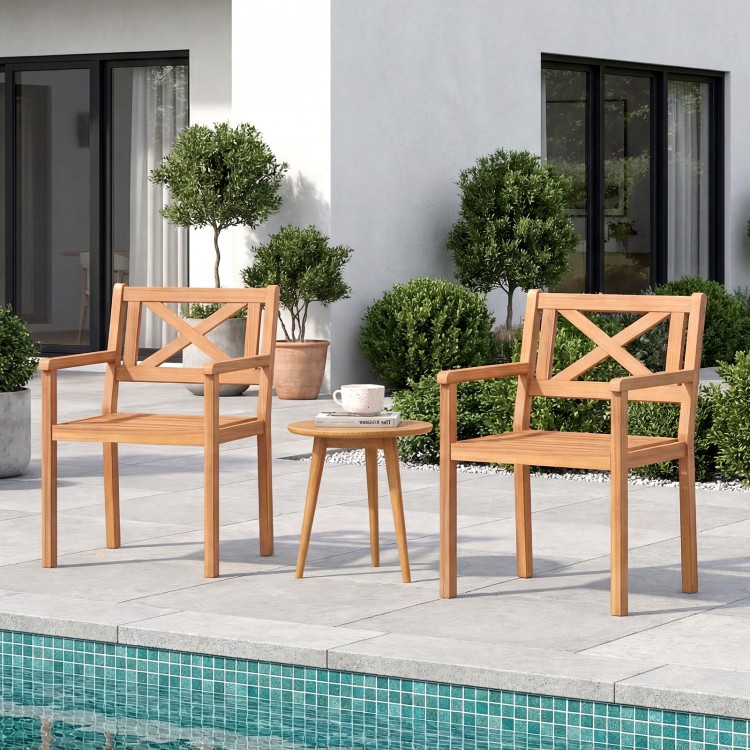Acacia wood patio dining chairs set of 2 with ergonomic backrests, ideal for outdoor relaxation by the pool.