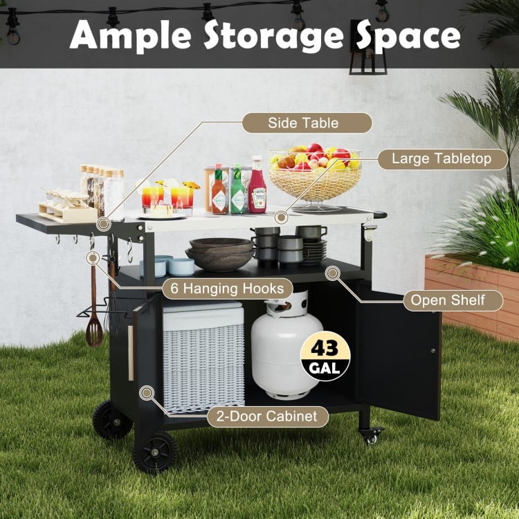 Outdoor grill cart with stainless steel top, ample storage, and folding side table, ideal for outdoor parties.