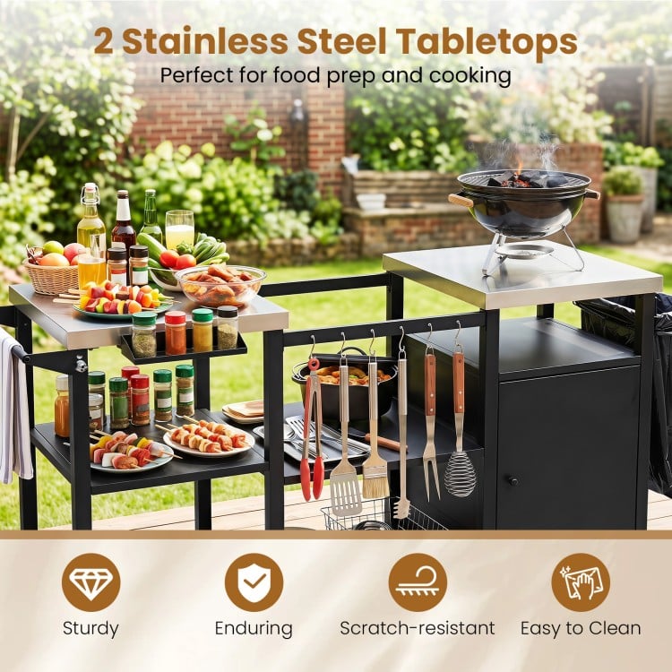 Outdoor grill cart featuring two stainless steel tabletops, ample storage hooks, and a concealed gas tank cabinet for BBQs.