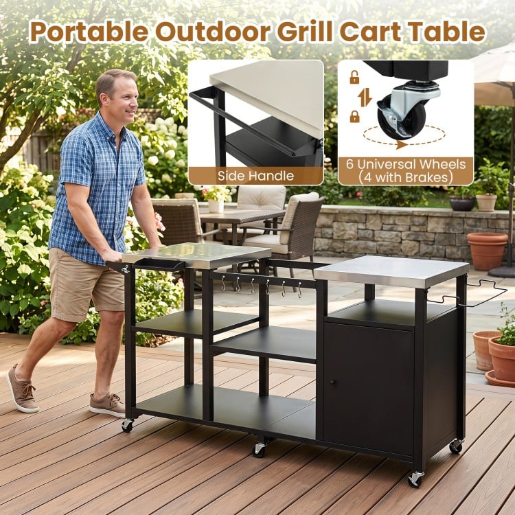 Portable outdoor grill cart table with stainless steel tabletops, hooks, and wheels for easy movement during BBQ gatherings.