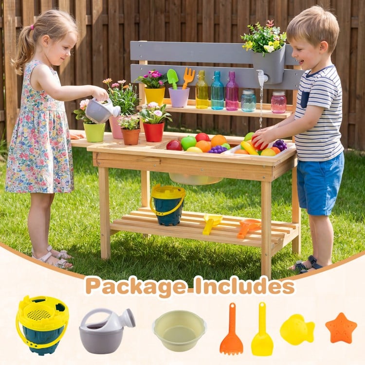 Kids playing with the Outdoor Kids Mud Kitchen featuring a natural fir wood design, water tank, and colorful.