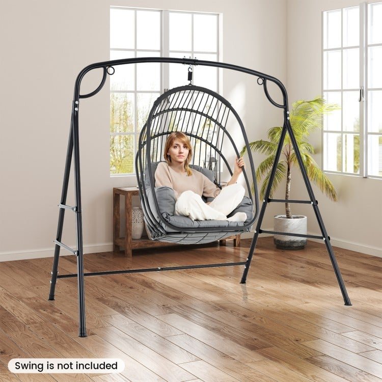 Outdoor metal swing stand in black with heavy-duty frame and 4 support bars, ideal for hanging chairs and swings.