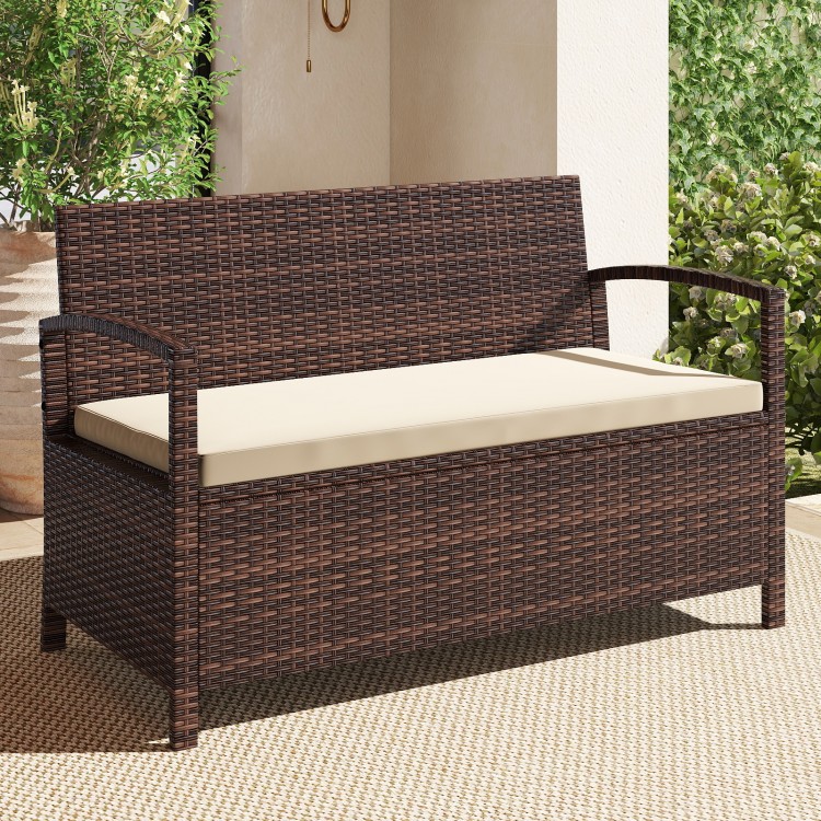 Outdoor PE wicker storage bench with beige cushion, 42-gallon capacity, perfect for patio or garden relaxation.