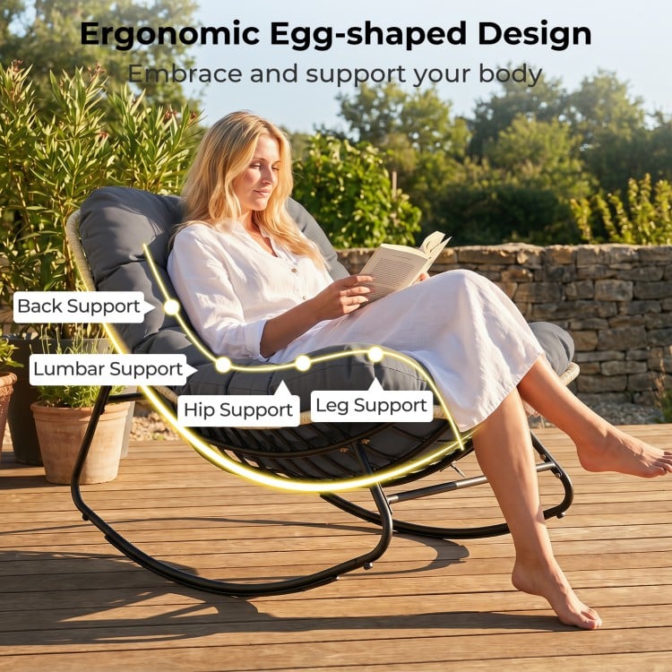 Ergonomic outdoor Papasan rocking chair with thick cushioned seat, providing back and lumbar support for patio.