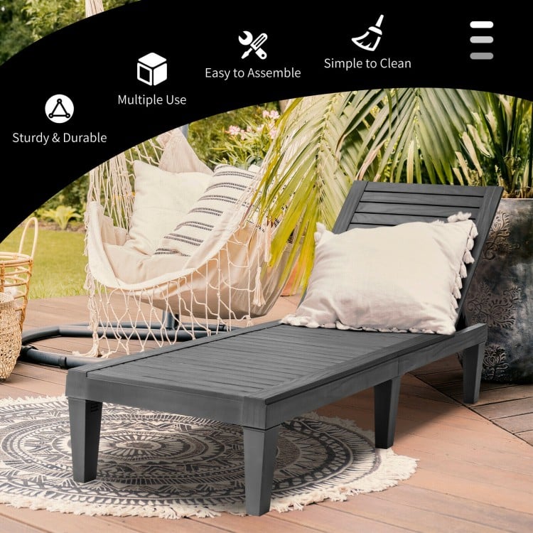 Black outdoor recliner chair with 5-position adjustable backrest, perfect for patio or poolside relaxation.