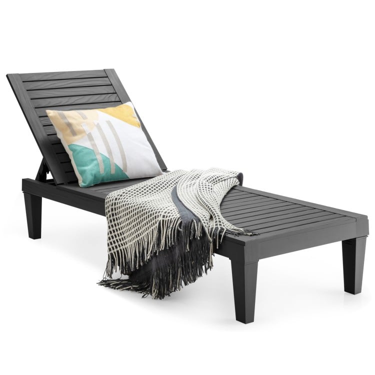 Black outdoor recliner chair with 5-position adjustable backrest, perfect for patio or poolside relaxation.