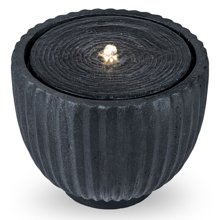 Round outdoor water fountain with pump, featuring a realistic stone look and warm white LED lights for garden ambiance.