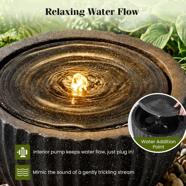 Outdoor round sphere water fountain with pump, featuring a realistic stone look and adjustable flow for tranquil garden.