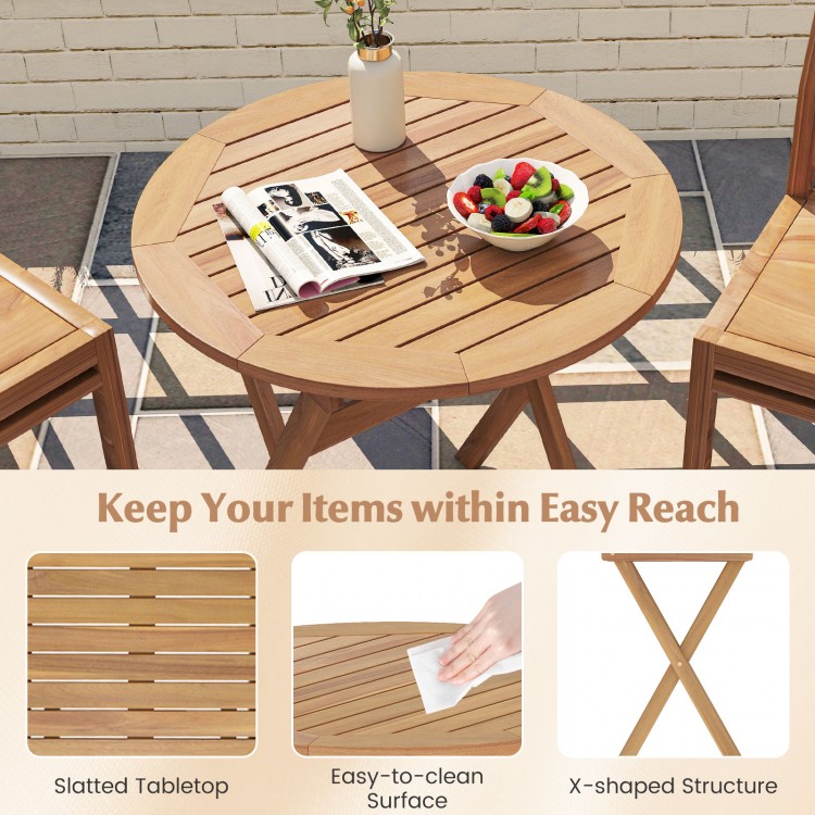 Round outdoor side table featuring a slatted tabletop and X-shaped structure, made of solid acacia wood for durability.