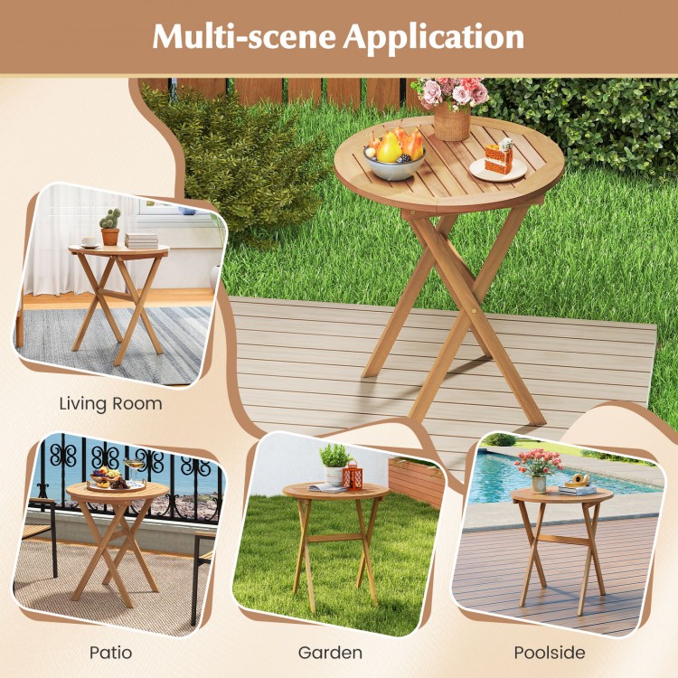 Outdoor side table with slatted tabletop and X-shaped structure, made of acacia wood, perfect for patio or garden use.