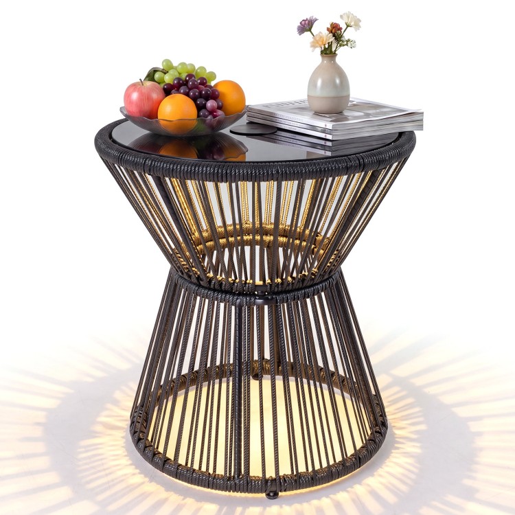 Outdoor side table with a black PE rattan base, tempered glass top, and LED warm light, perfect for patios or gardens.