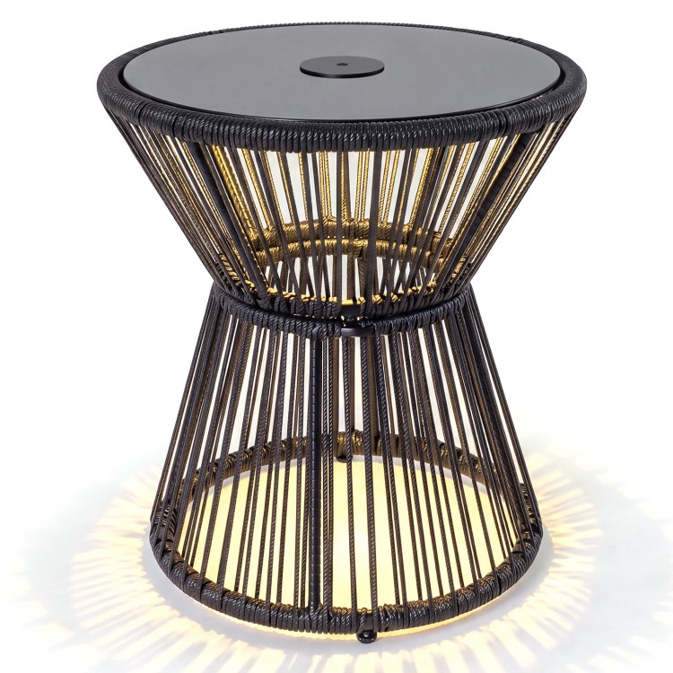 Outdoor side table with LED warm light, tempered glass top, and black PE rattan design for patio or garden use.