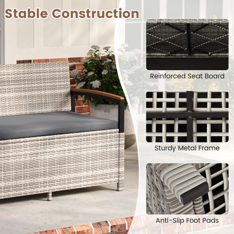 Outdoor storage bench with gray cushion, sturdy metal frame, and reinforced seat board for patio or garden use.